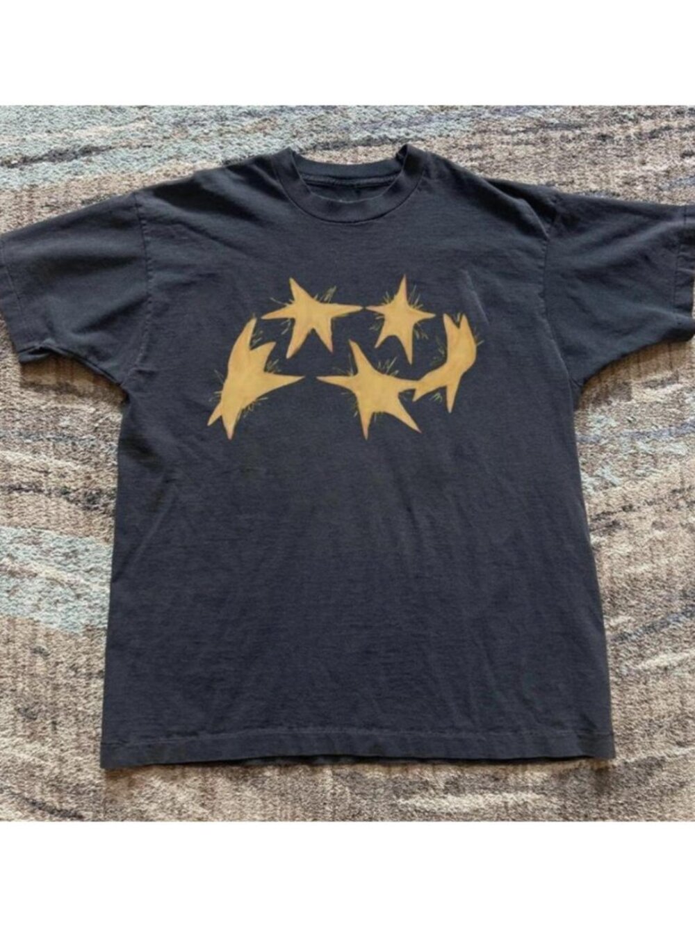 Black and yellow star dancing graphic tee